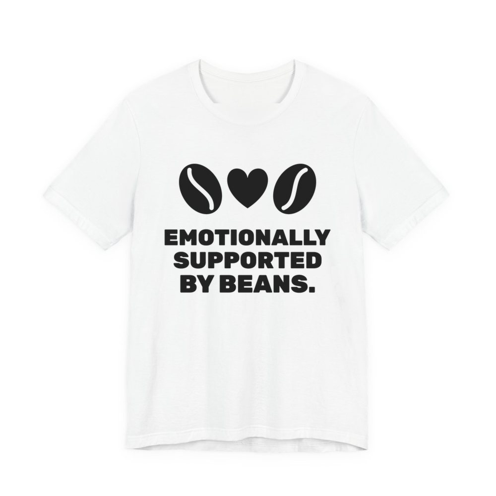 White t-shirt printed in dark ink with two coffee beans and a heart and the words “Emotionally Supported by Beans.”
