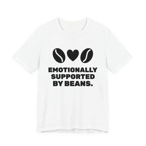 White t-shirt printed in dark ink with two coffee beans and a heart and the words “Emotionally Supported by Beans.”