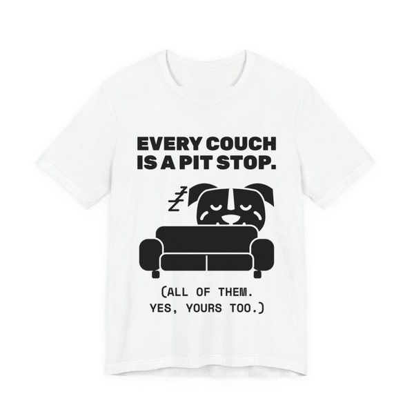 White t-shirt printed in dark ink with a pit bull napping on a couch and the words “Every Couch Is a Pit Stop. (All of them. Yes, yours too.)”