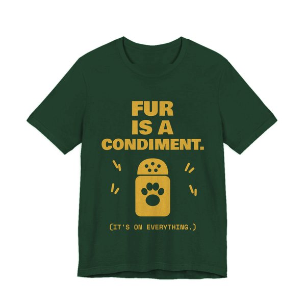 Forest t-shirt printed in gold ink with a shaker with a paw print and the words “Fur Is a Condiment. (It's on everything.)”