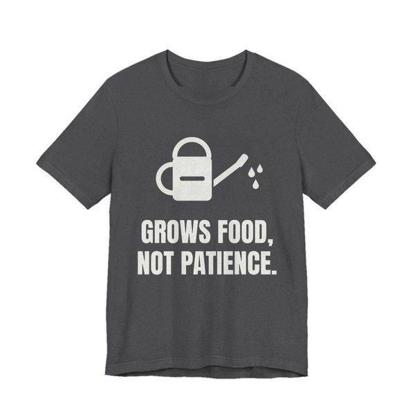 Dark Grey Heather t-shirt printed in off-white ink with a watering can and the words “Grows Food, Not Patience.”