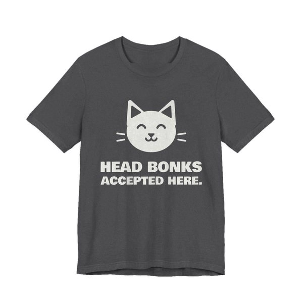 Dark Grey Heather t-shirt printed in off-white ink with a cat face and the words “Head Bonks Accepted Here.”