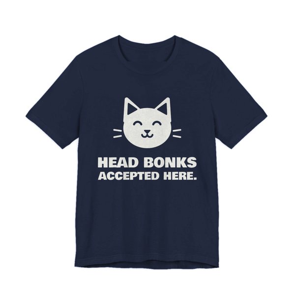 Navy t-shirt printed in off-white ink with a cat face and the words “Head Bonks Accepted Here.”