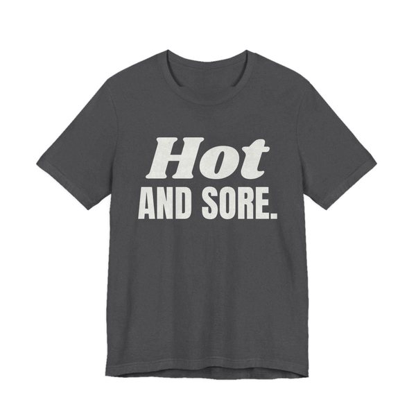 Dark Grey Heather t-shirt printed in off-white ink with the words "Hot and Sore."