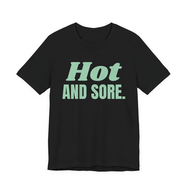 Black t-shirt printed in mint green ink with the words "Hot and Sore."
