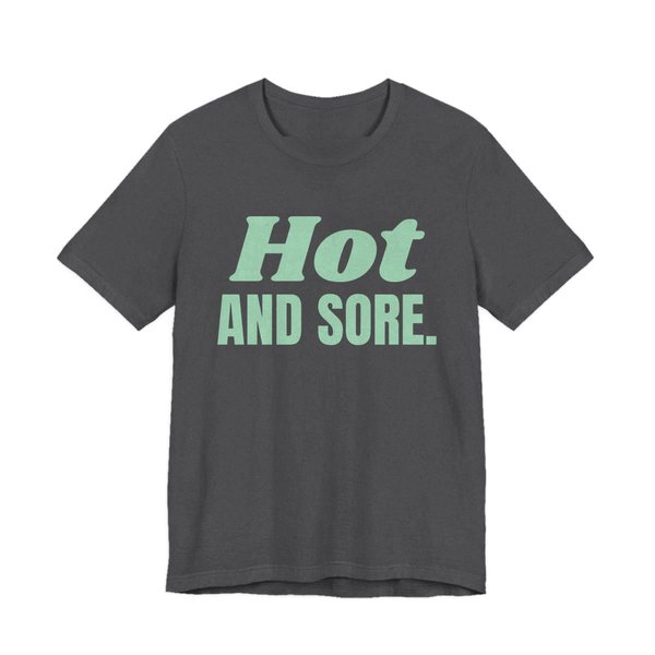 Dark Grey Heather t-shirt printed in mint green ink with the words "Hot and Sore."