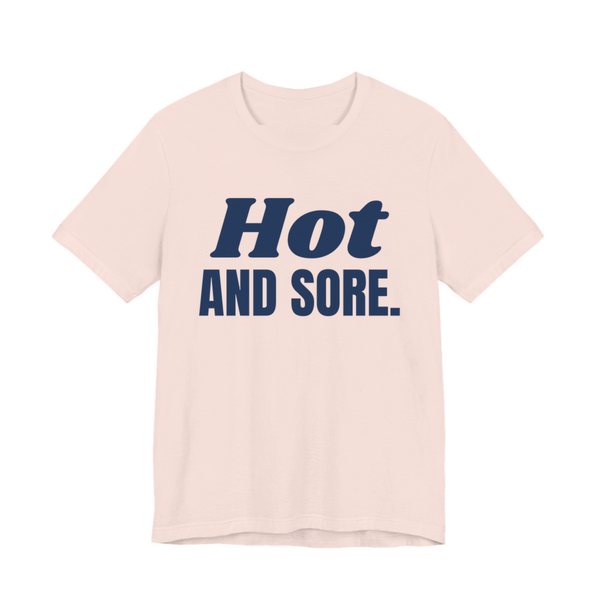 Soft Pink t-shirt printed in navy blue ink with the words "Hot and Sore."
