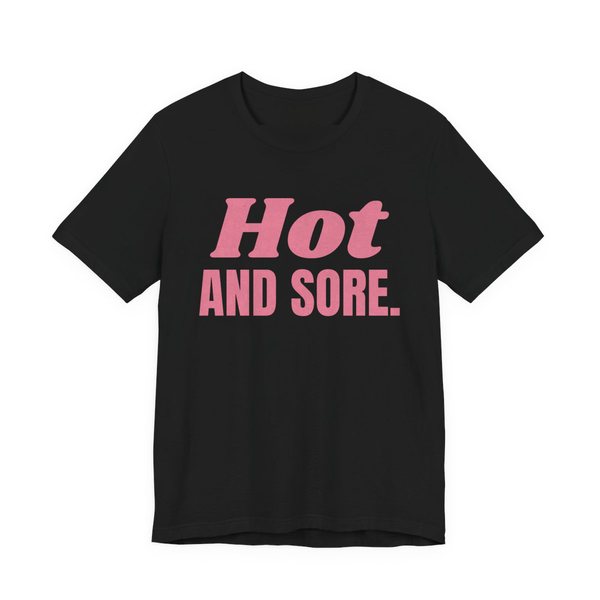 Black t-shirt printed in rose pink ink with the words "Hot and Sore."