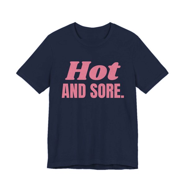 Navy t-shirt printed in rose pink ink with the words "Hot and Sore."