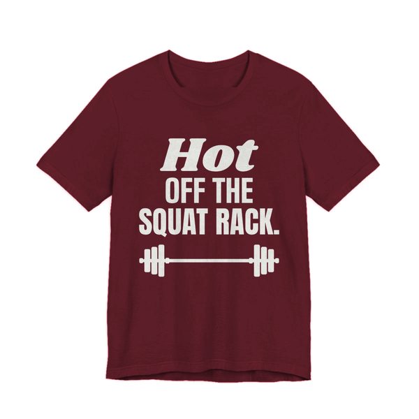 Maroon t-shirt printed in off-white ink with a barbell and the words "Hot Off the Squat Rack."