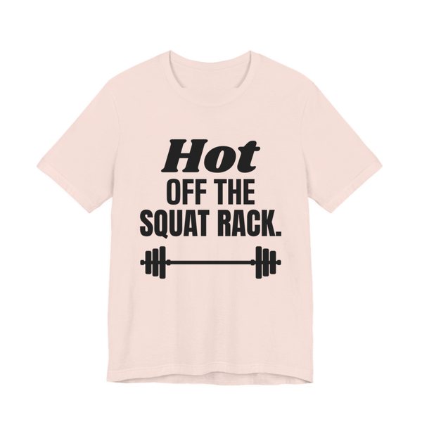 Soft Pink t-shirt printed in dark ink with a barbell and the words "Hot Off the Squat Rack."
