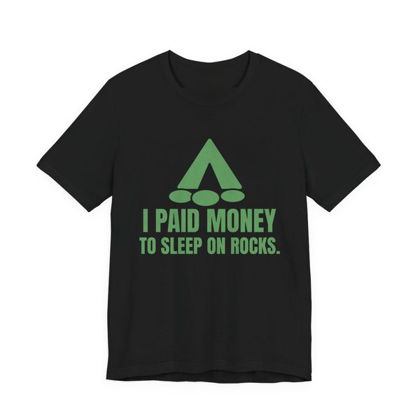 Black t-shirt printed in pine green ink with a tent, a pile of rocks and the words “I Paid Money to Sleep on Rocks.”