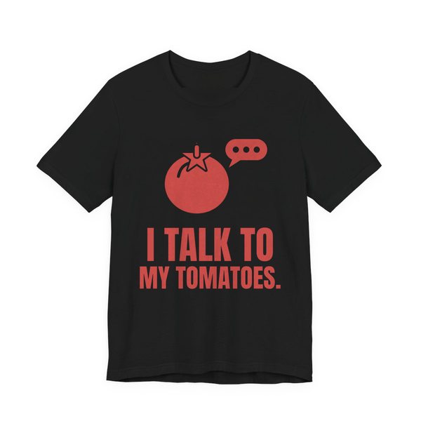 Black t-shirt printed in tomato red ink with a tomato with a speech bubble and the words “I Talk to My Tomatoes.”