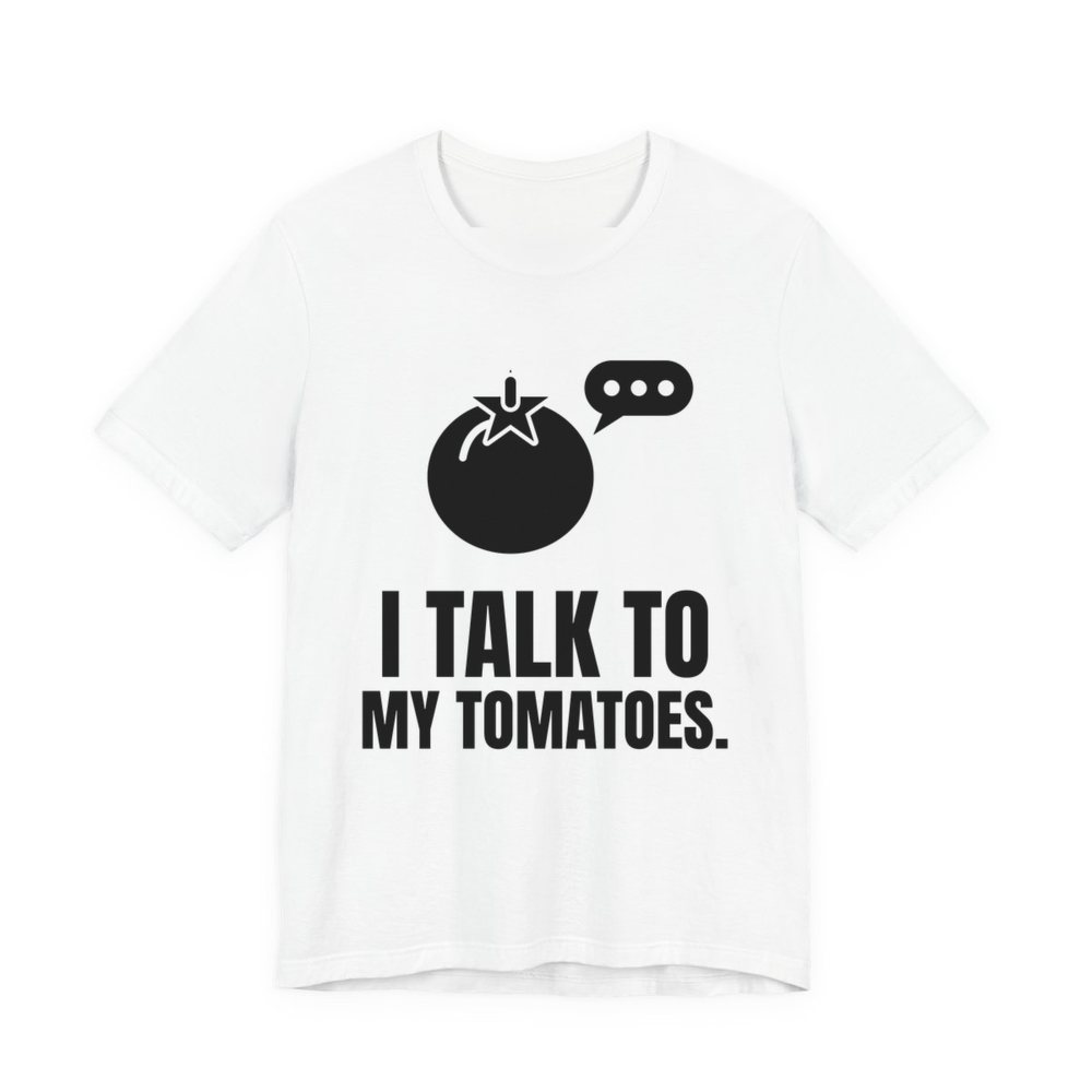 White t-shirt printed in dark ink with a tomato with a speech bubble and the words “I Talk to My Tomatoes.”