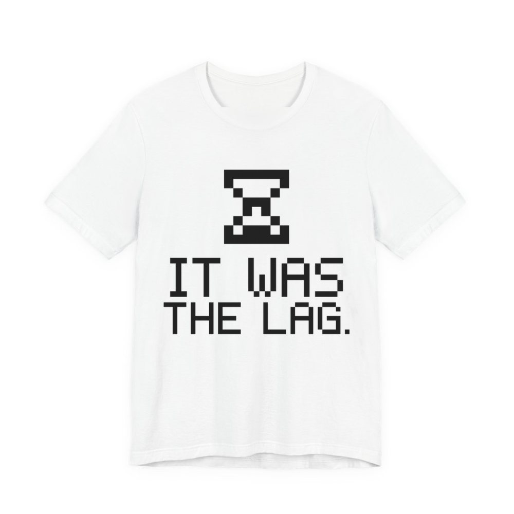 White t-shirt printed in dark ink with a pixel hourglass and the words “It Was the Lag.”