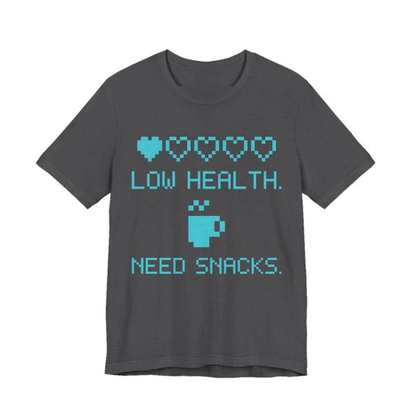 Dark Grey Heather t-shirt printed in cyan ink with a row of pixel hearts, a pixel mug and the words “Low Health. Need Snacks.”
