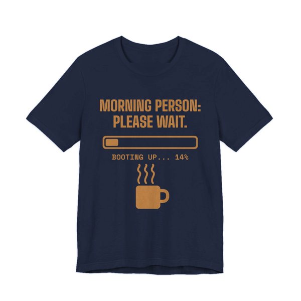 Navy t-shirt printed in caramel ink with a loading bar, a steaming mug and the words “Morning Person: Please Wait. Booting up... 14%”