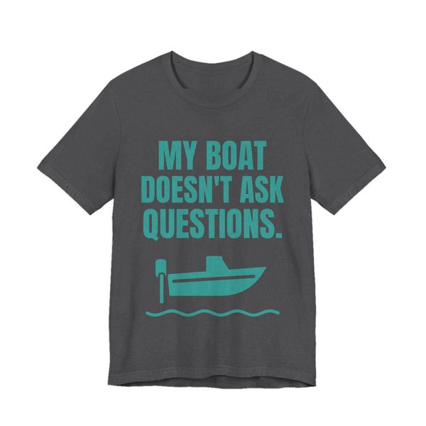 Dark Grey Heather t-shirt printed in teal ink with a boat on the waves and the words “My Boat Doesn't Ask Questions.”