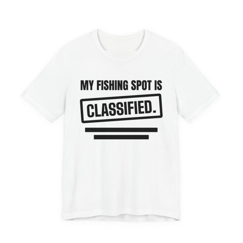 White t-shirt printed in dark ink with a stamp box, redaction bars and the words “My Fishing Spot Is Classified.”