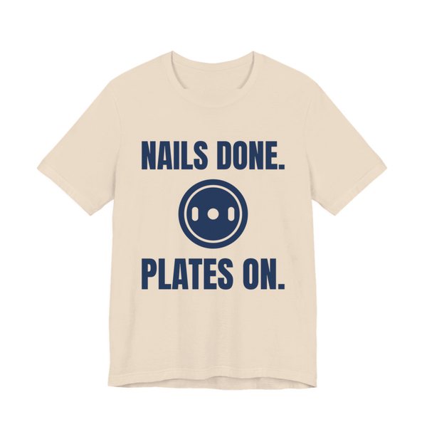 Soft Cream t-shirt printed in navy blue ink with a weight plate between the words "Nails Done." and "Plates On."