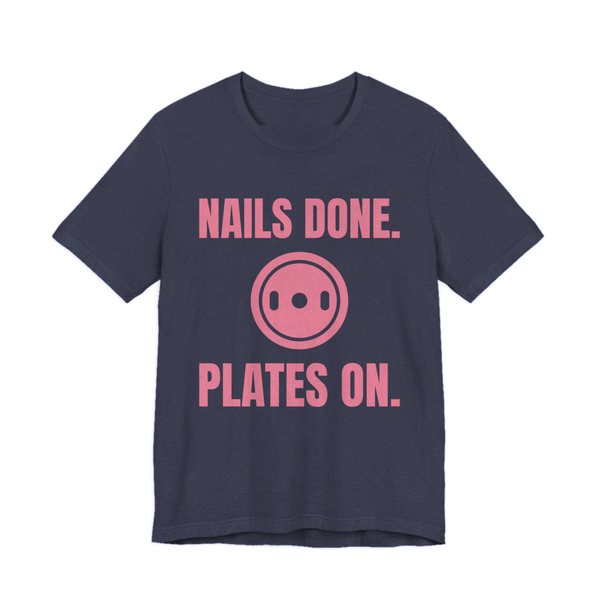 Heather Navy t-shirt printed in rose pink ink with a weight plate between the words "Nails Done." and "Plates On."