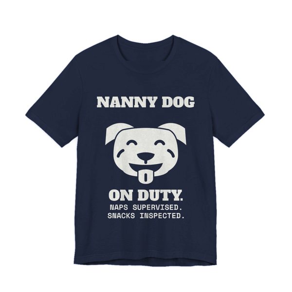Navy t-shirt printed in off-white ink with a smiling pit bull face and the words “Nanny Dog On Duty. Naps Supervised. Snacks Inspected.”