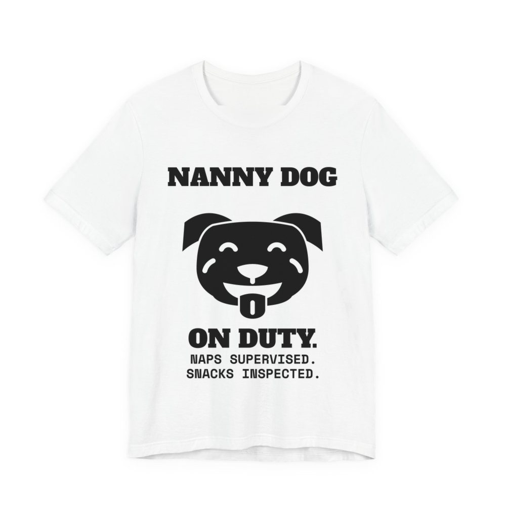 White t-shirt printed in dark ink with a smiling pit bull face and the words “Nanny Dog On Duty. Naps Supervised. Snacks Inspected.”