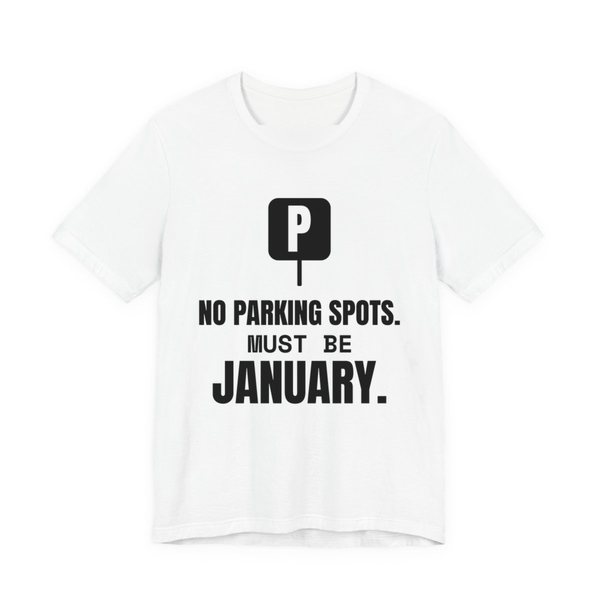 White t-shirt printed in dark ink with a parking sign and the words “No Parking Spots. Must Be January.”