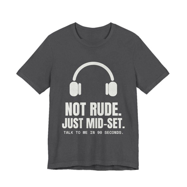 Dark Grey Heather t-shirt printed in off-white ink with a pair of headphones and the words “Not Rude. Just Mid-Set. Talk to me in 90 seconds.”