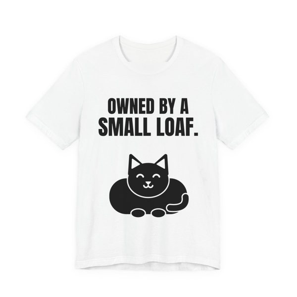 White t-shirt printed in dark ink with a loaf-shaped cat and the words “Owned by a Small Loaf.”