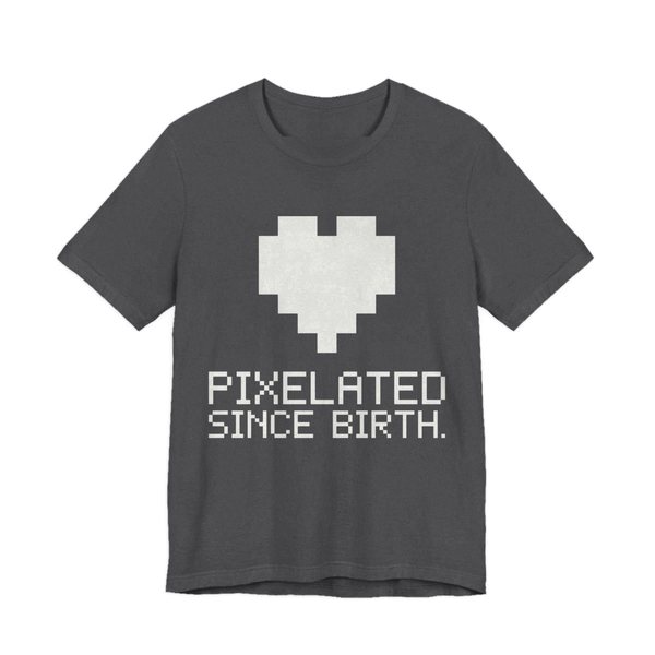 Dark Grey Heather t-shirt printed in off-white ink with a big pixel heart and the words “Pixelated Since Birth.”