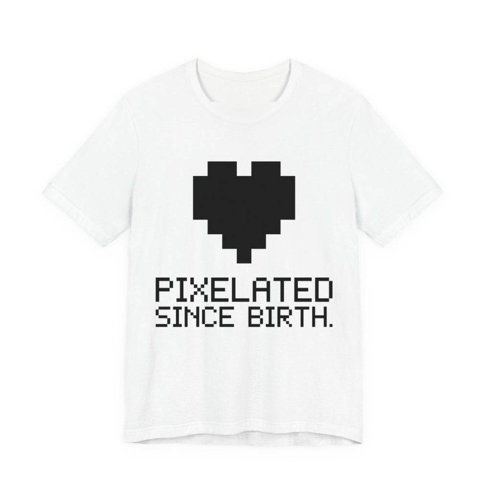 White t-shirt printed in dark ink with a big pixel heart and the words “Pixelated Since Birth.”