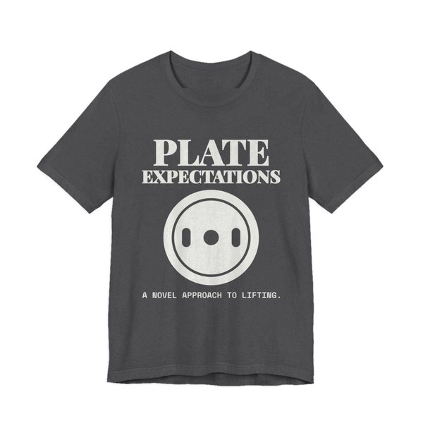 Dark Grey Heather t-shirt printed in off-white ink with a weight plate and the words “Plate Expectations. A Novel Approach to Lifting.”
