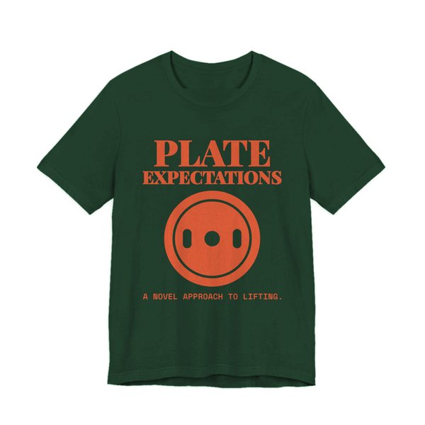 Forest t-shirt printed in orange ink with a weight plate and the words “Plate Expectations. A Novel Approach to Lifting.”