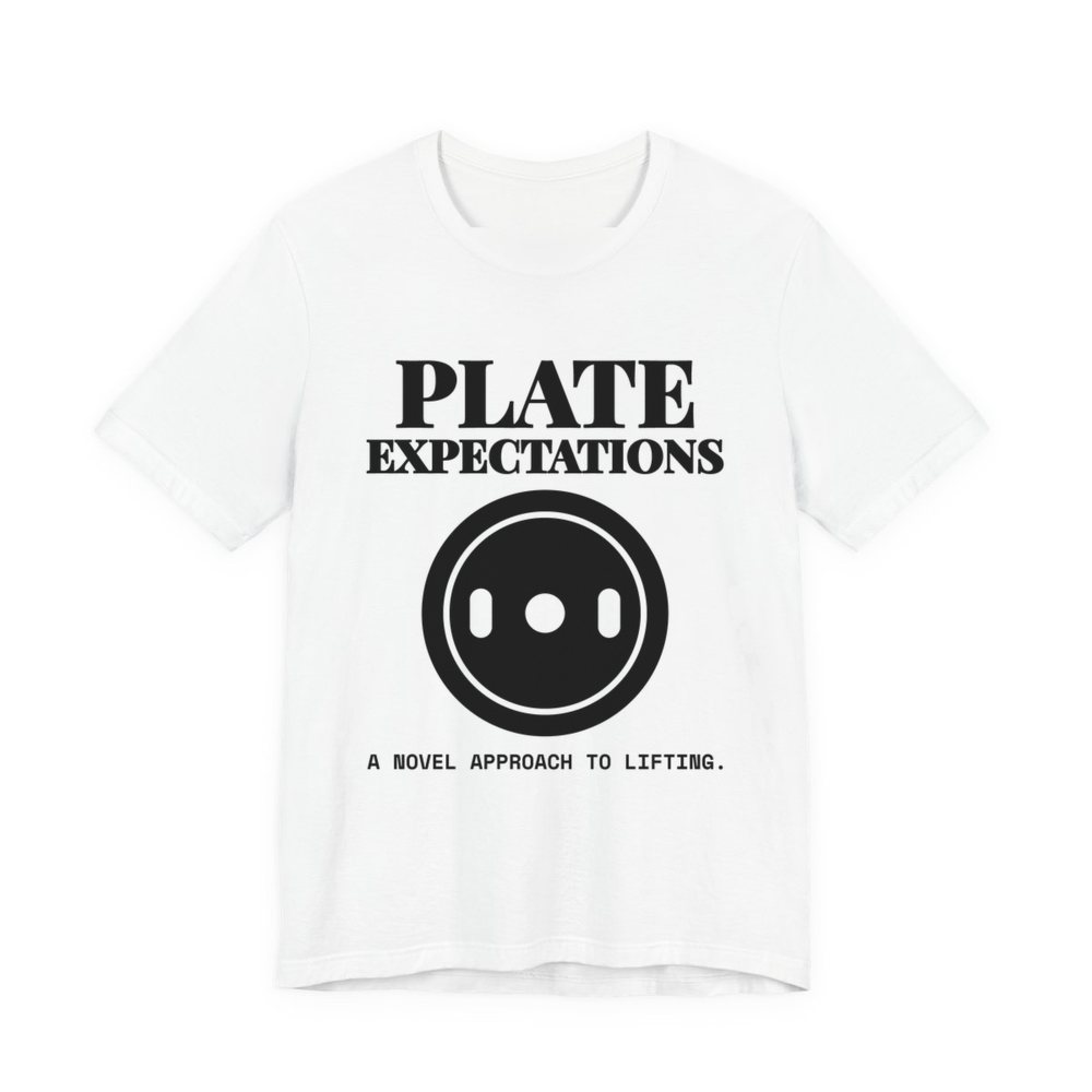 White t-shirt printed in dark ink with a weight plate and the words “Plate Expectations. A Novel Approach to Lifting.”