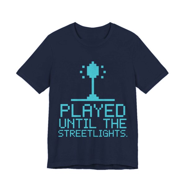 Navy t-shirt printed in cyan ink with a pixel streetlight and the words “Played Until the Streetlights.”