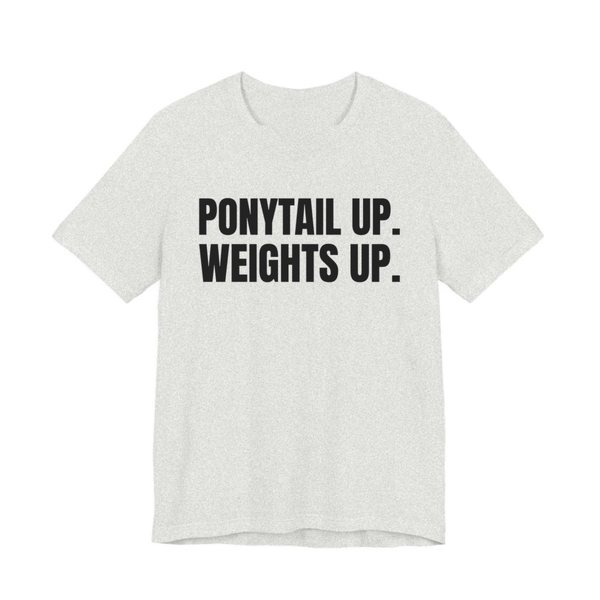 Ash t-shirt printed in dark ink with the words "Ponytail Up. Weights Up."