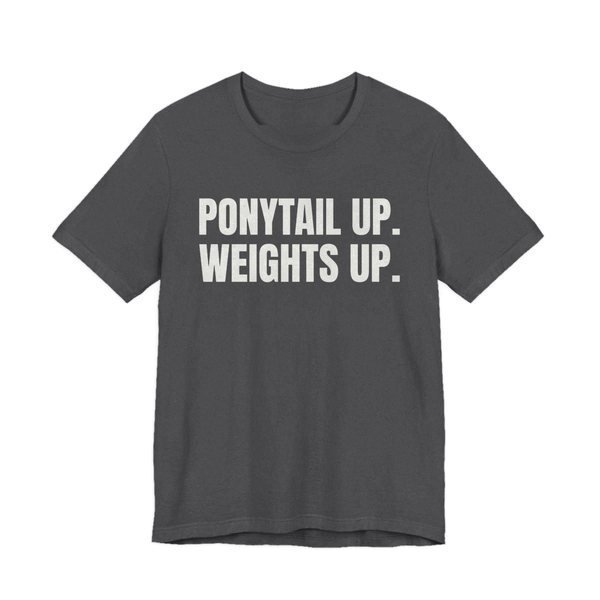 Dark Grey Heather t-shirt printed in off-white ink with the words "Ponytail Up. Weights Up."