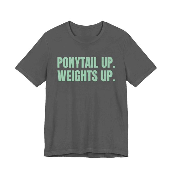 Asphalt t-shirt printed in mint green ink with the words "Ponytail Up. Weights Up."