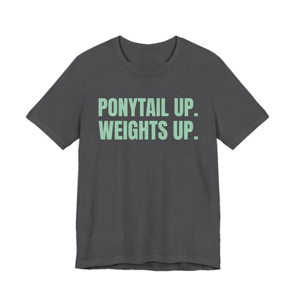 Dark Grey Heather t-shirt printed in mint green ink with the words "Ponytail Up. Weights Up."