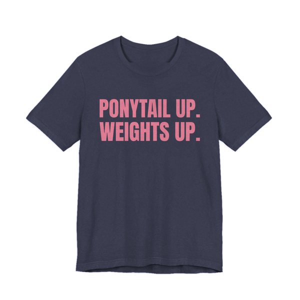 Heather Navy t-shirt printed in rose pink ink with the words "Ponytail Up. Weights Up."