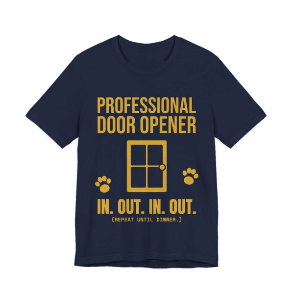 Navy t-shirt printed in gold ink with a door, paw prints and the words “Professional Door Opener. In. Out. In. Out. (Repeat until dinner.)”