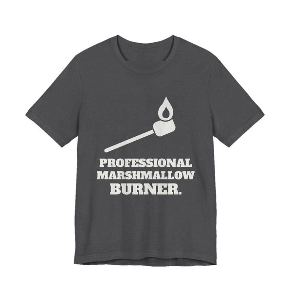 Dark Grey Heather t-shirt printed in off-white ink with a flaming marshmallow on a stick and the words “Professional Marshmallow Burner.”
