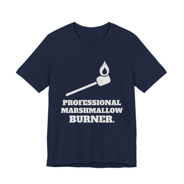 Navy t-shirt printed in off-white ink with a flaming marshmallow on a stick and the words “Professional Marshmallow Burner.”