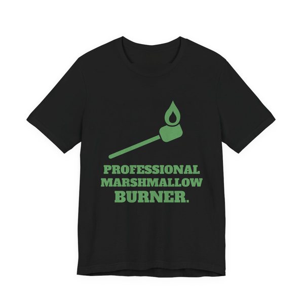 Black t-shirt printed in pine green ink with a flaming marshmallow on a stick and the words “Professional Marshmallow Burner.”