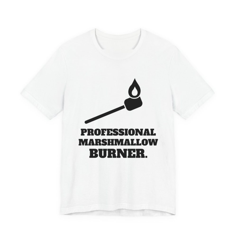 White t-shirt printed in dark ink with a flaming marshmallow on a stick and the words “Professional Marshmallow Burner.”