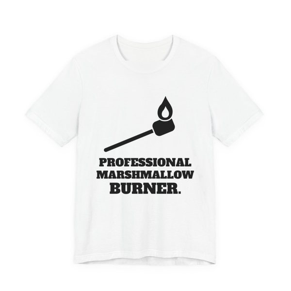 White t-shirt printed in dark ink with a flaming marshmallow on a stick and the words “Professional Marshmallow Burner.”
