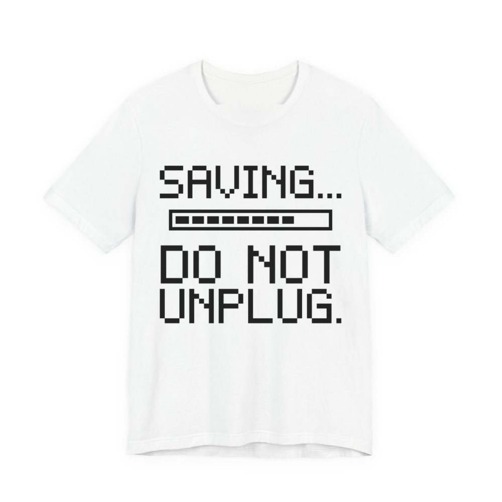 White t-shirt printed in dark ink with a pixel progress bar and the words “Saving... Do Not Unplug.”