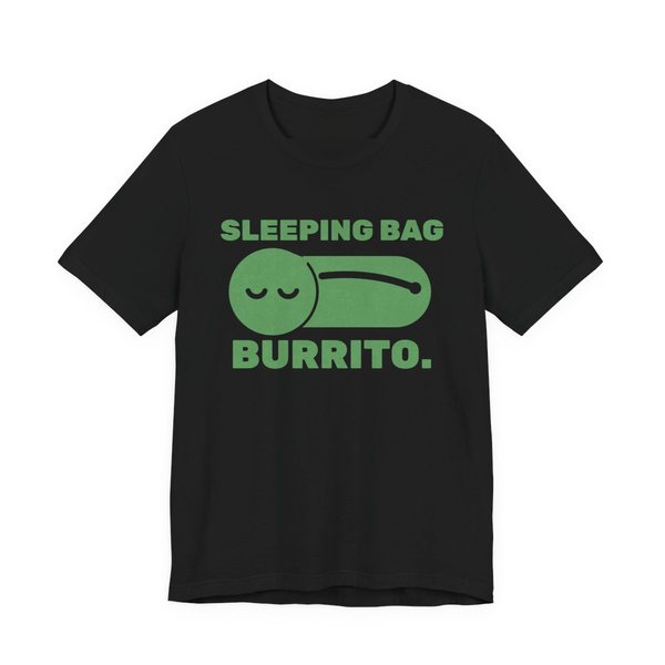 Black t-shirt printed in pine green ink with a sleeper zipped into a sleeping bag and the words “Sleeping Bag Burrito.”