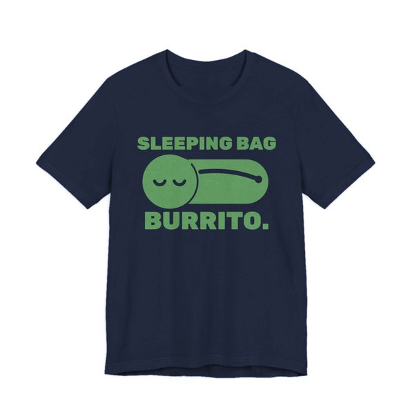 Navy t-shirt printed in pine green ink with a sleeper zipped into a sleeping bag and the words “Sleeping Bag Burrito.”